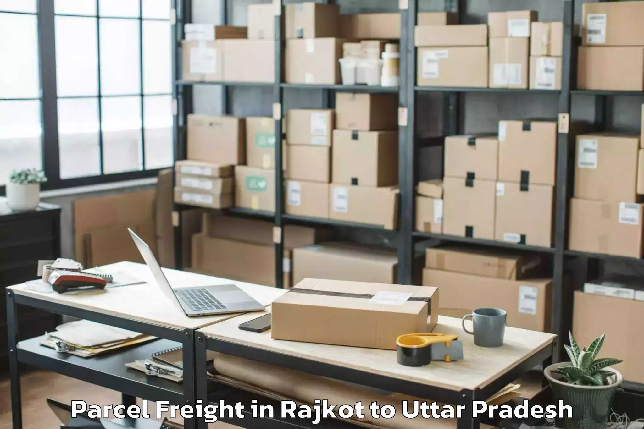 Top Rajkot to Phoenix United Mall Lucknow Parcel Freight Available